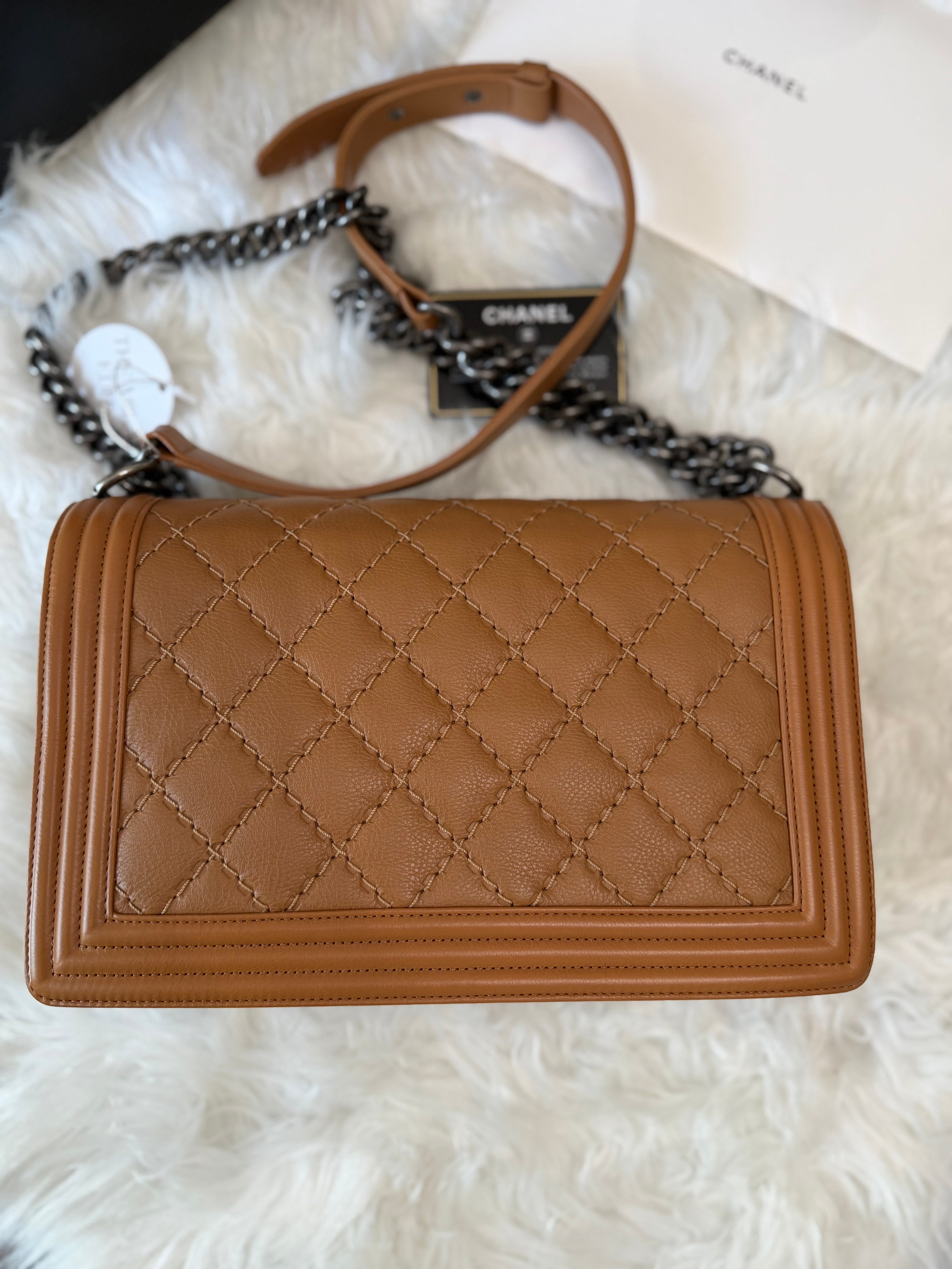 CHANEL BOY FLAP BAG IN CAVIAR LEATHER