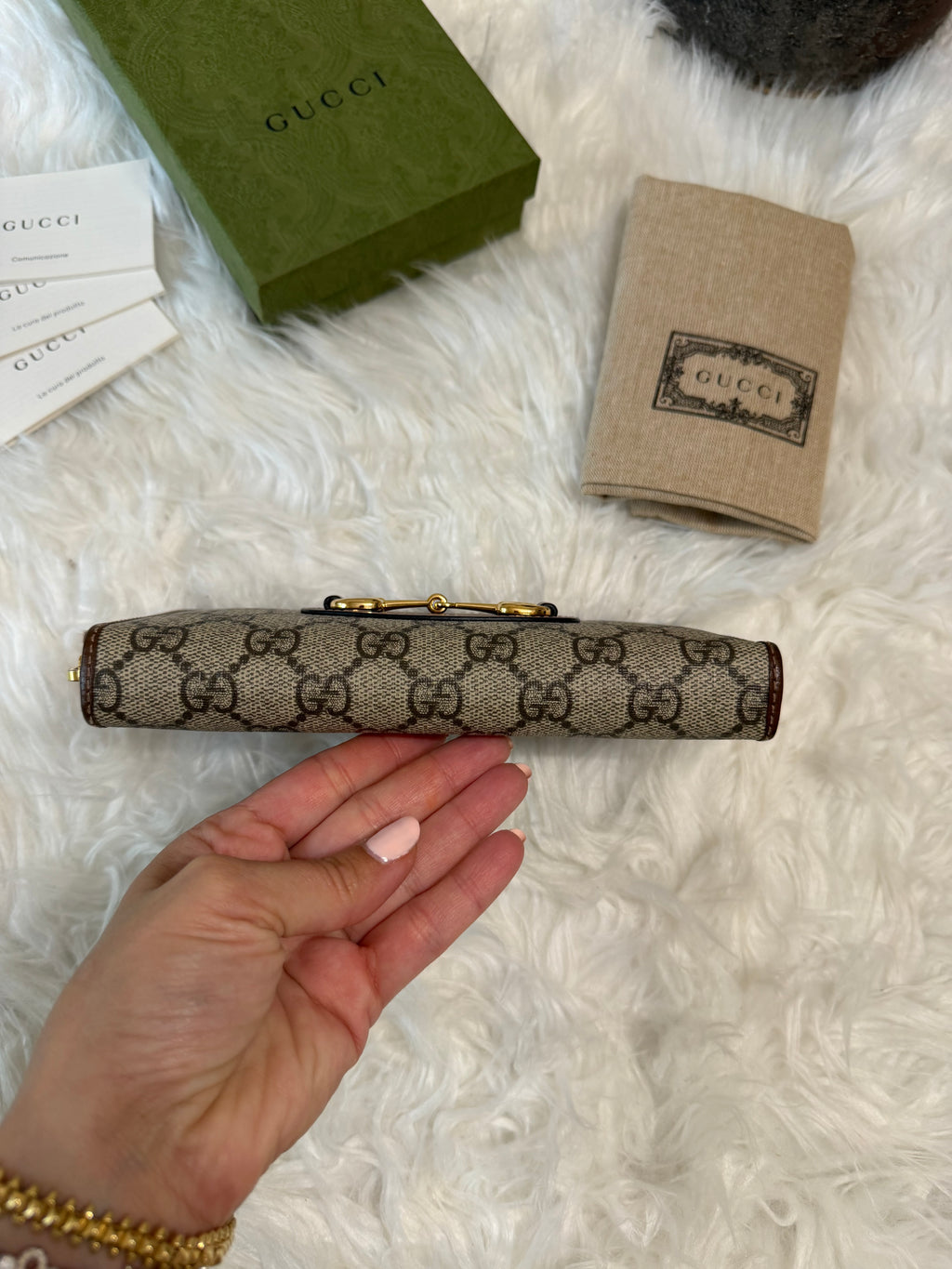 GUCCI  HORSESHOE SUPREME ZIP AROUND QUILTED CANVAS WALLET