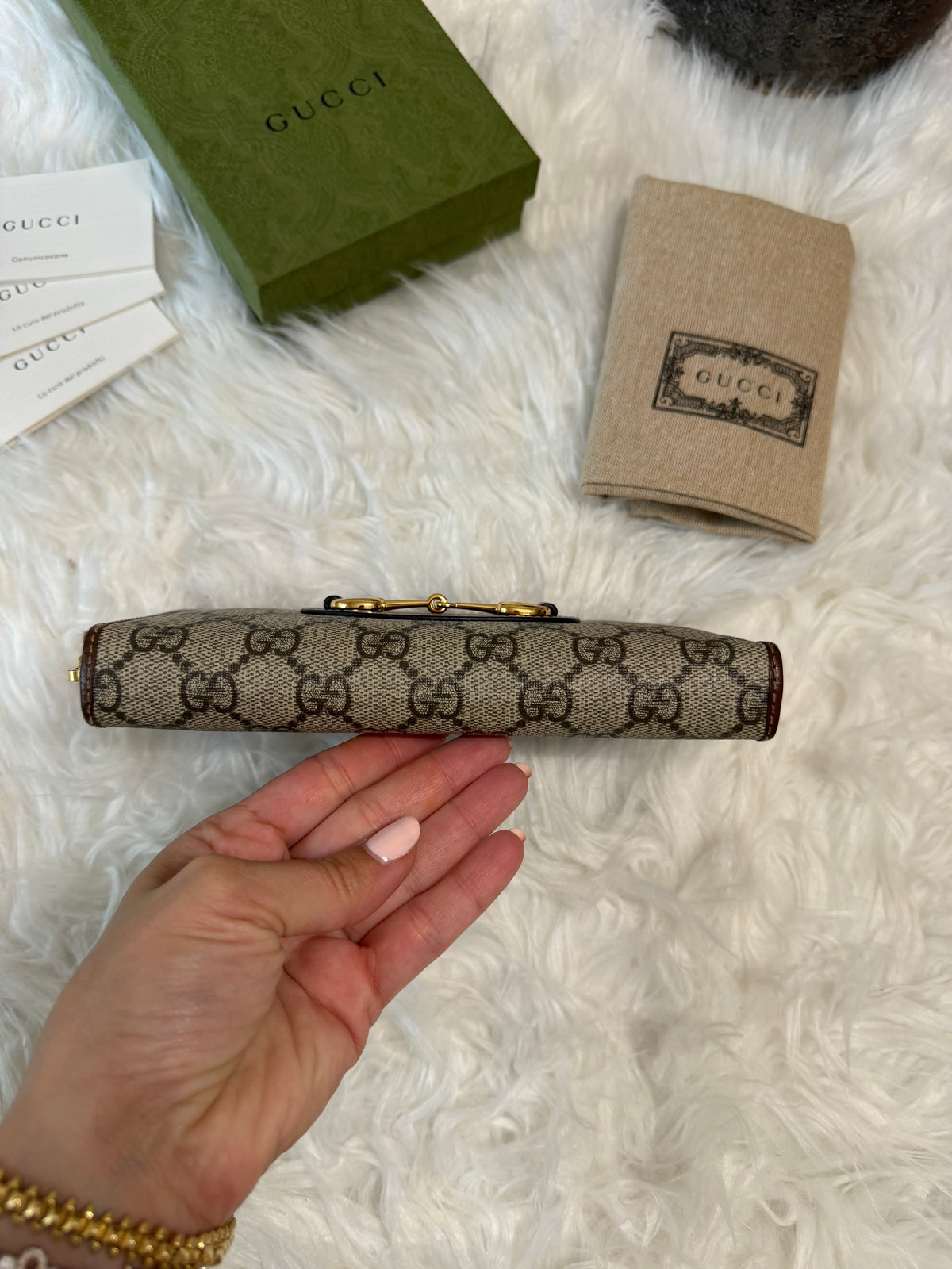 GUCCI  HORSESHOE SUPREME ZIP AROUND QUILTED CANVAS WALLET