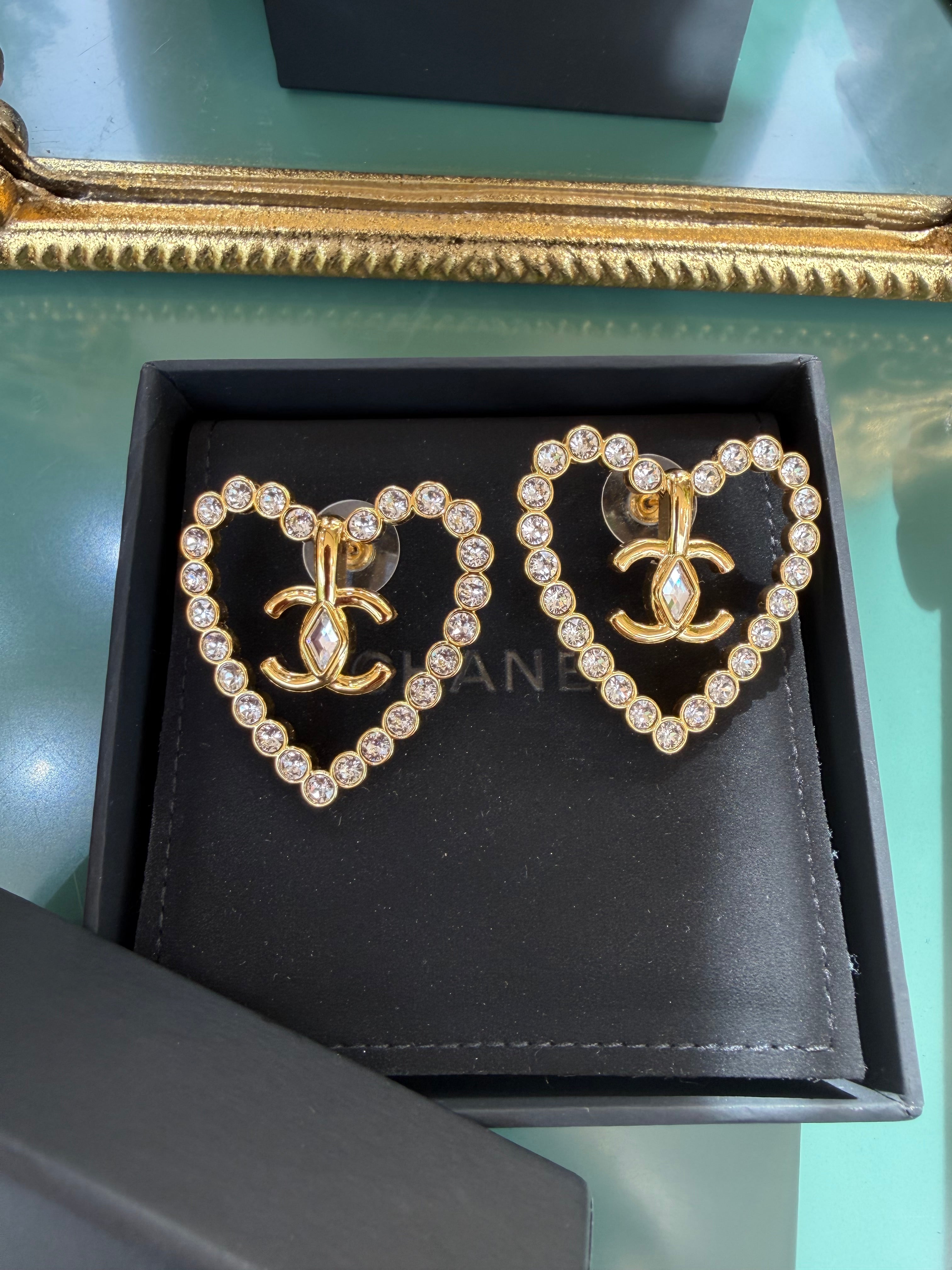 CHANEL HEART CUT OUT STUD EARRINGS