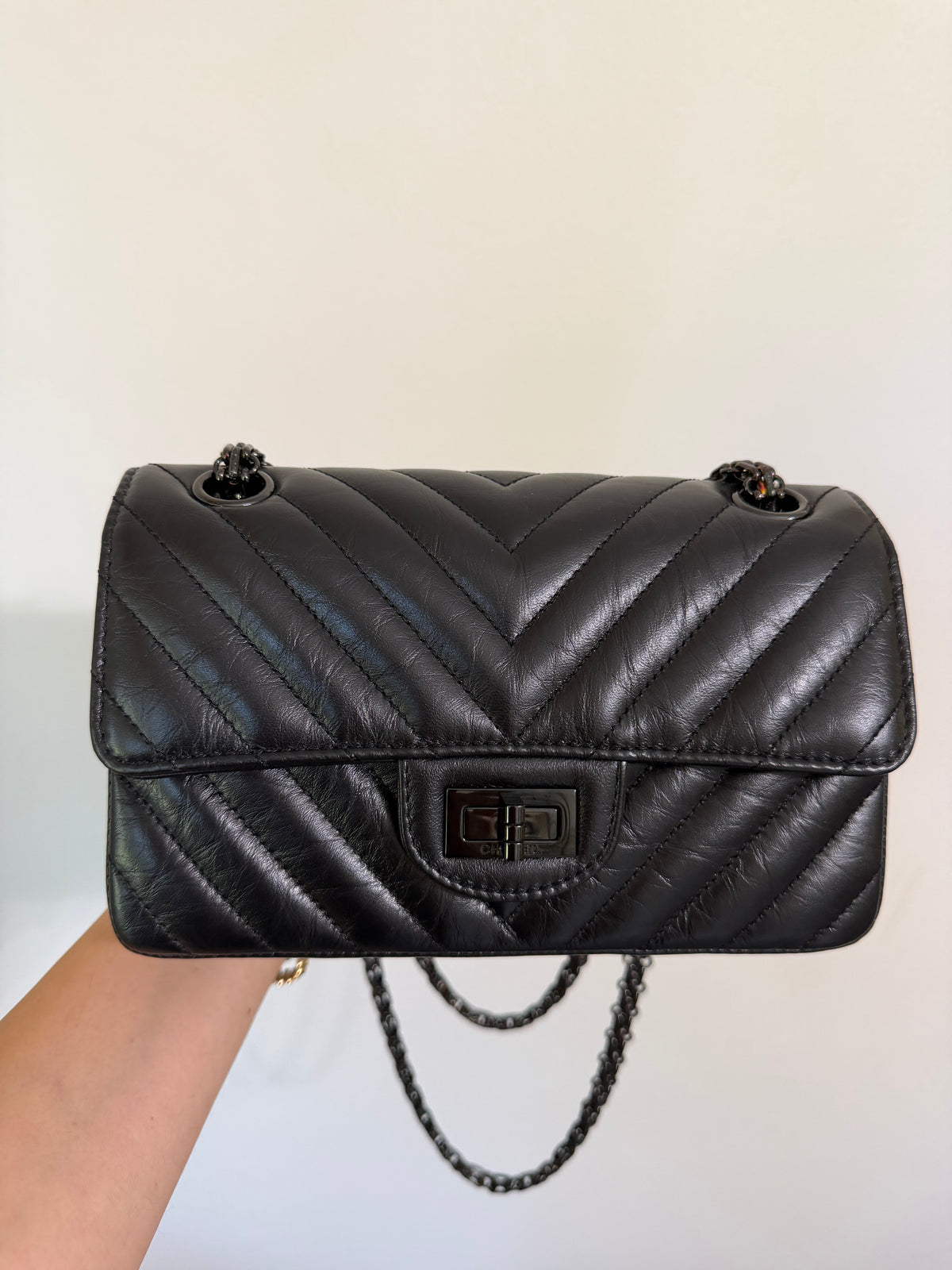 CHANEL SO BLACK REISSUE 2.55 FLAP CHEVRON AGED CALFSKIN