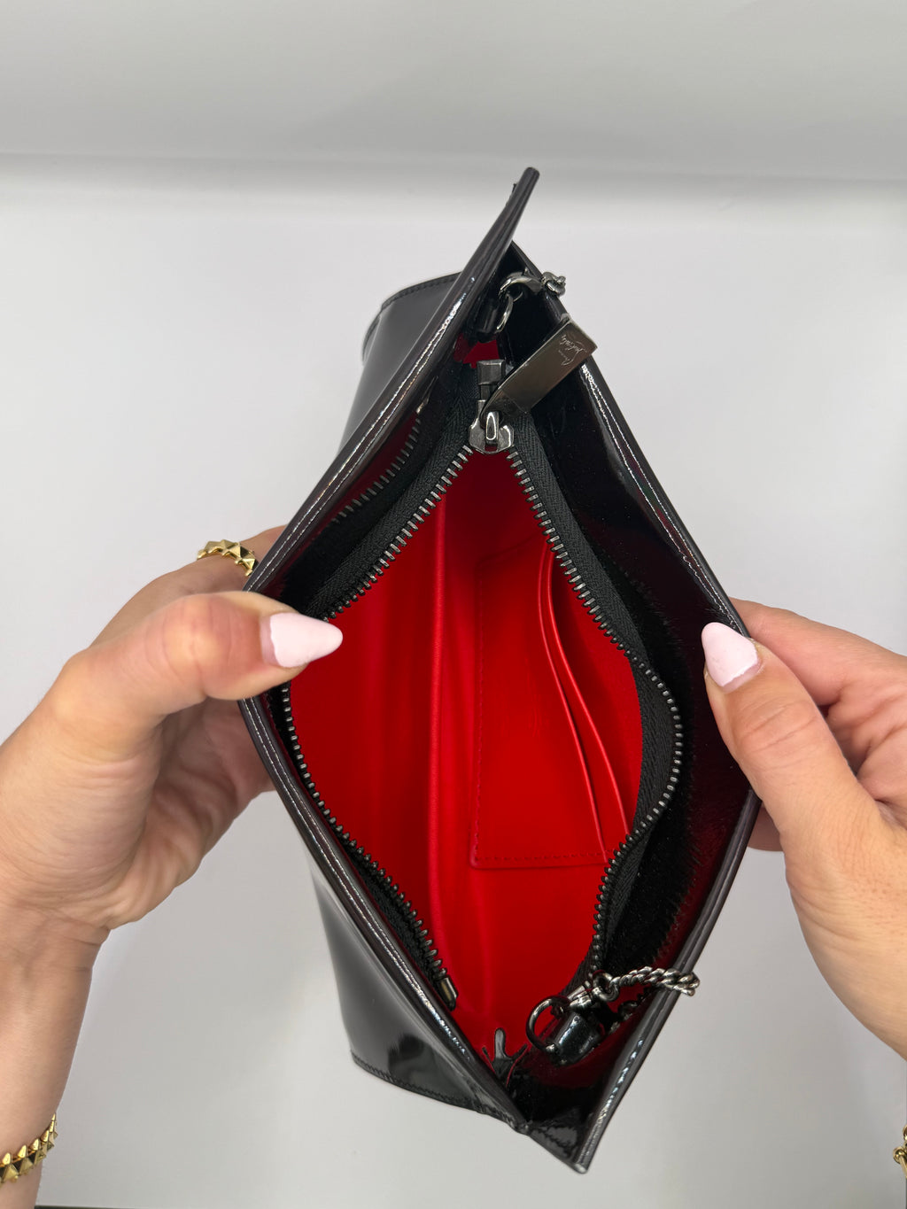 Christian Louboutin Loubitwist Patent leather small clutch