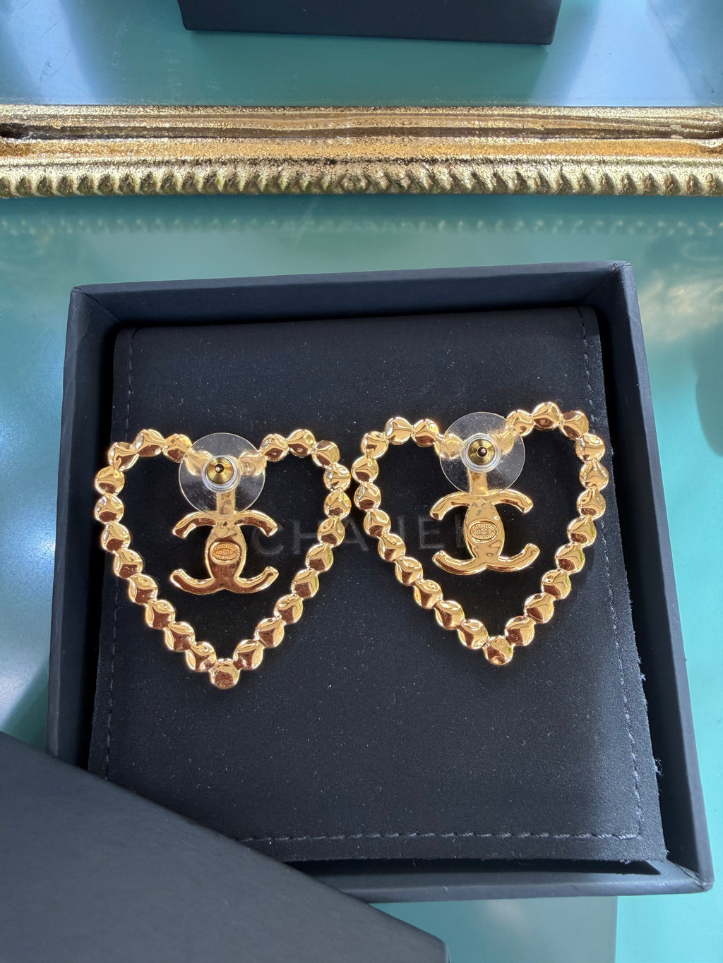 CHANEL HEART CUT OUT STUD EARRINGS