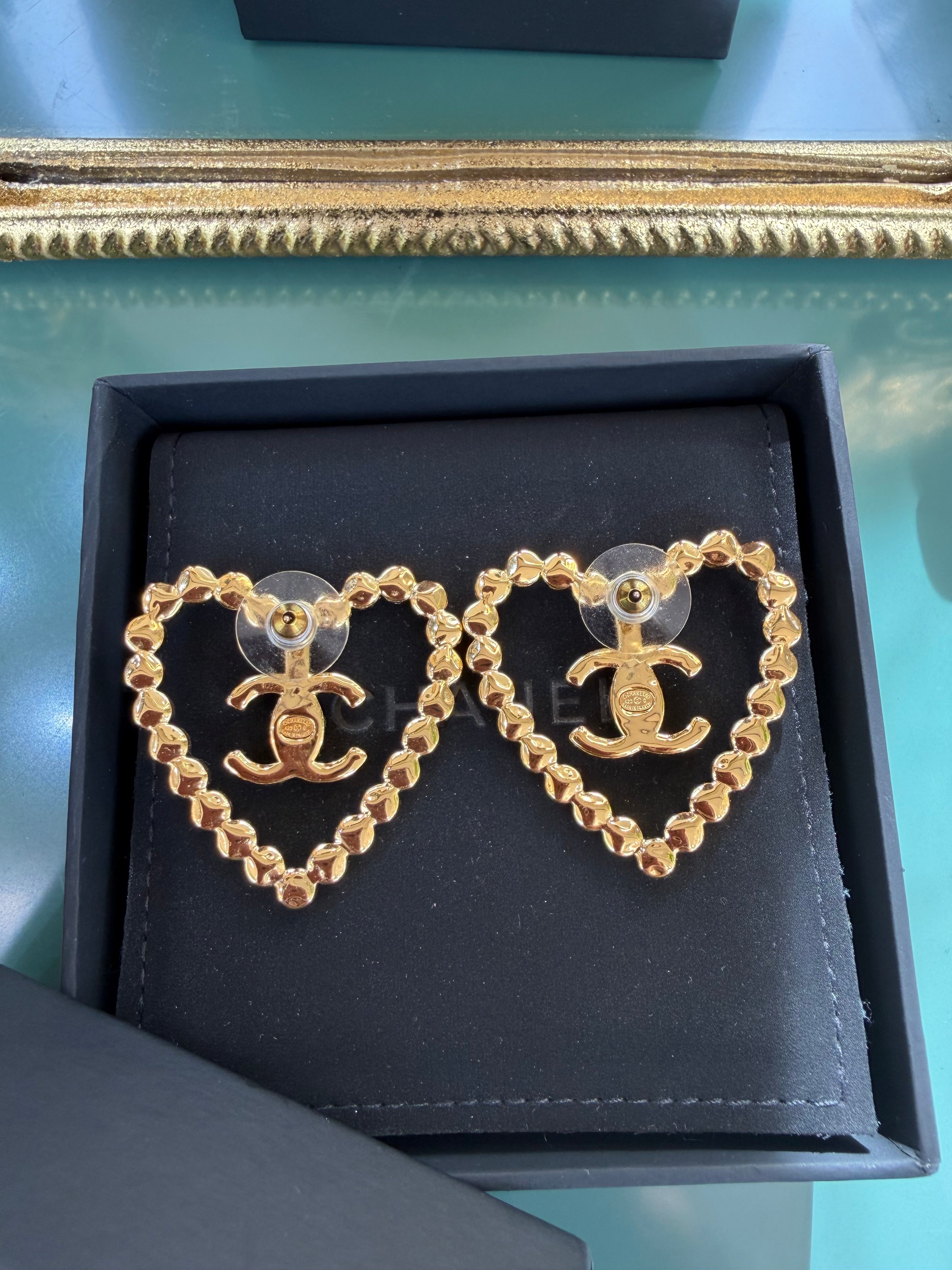 CHANEL HEART CUT OUT STUD EARRINGS