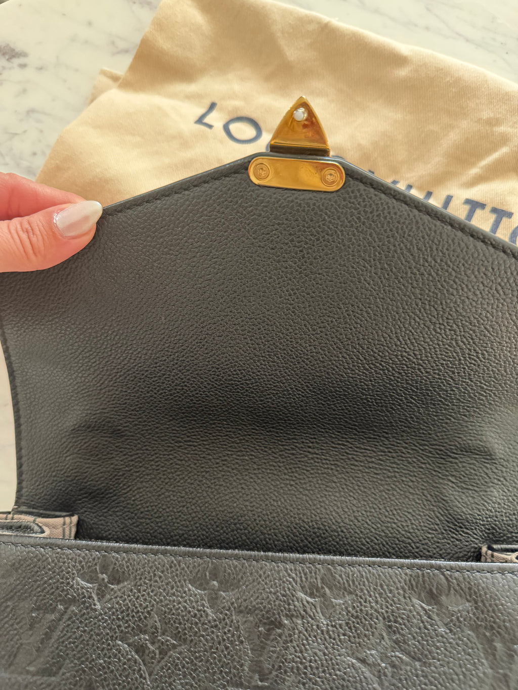 Louis Vuitton Pochette Metis Empreinte bag