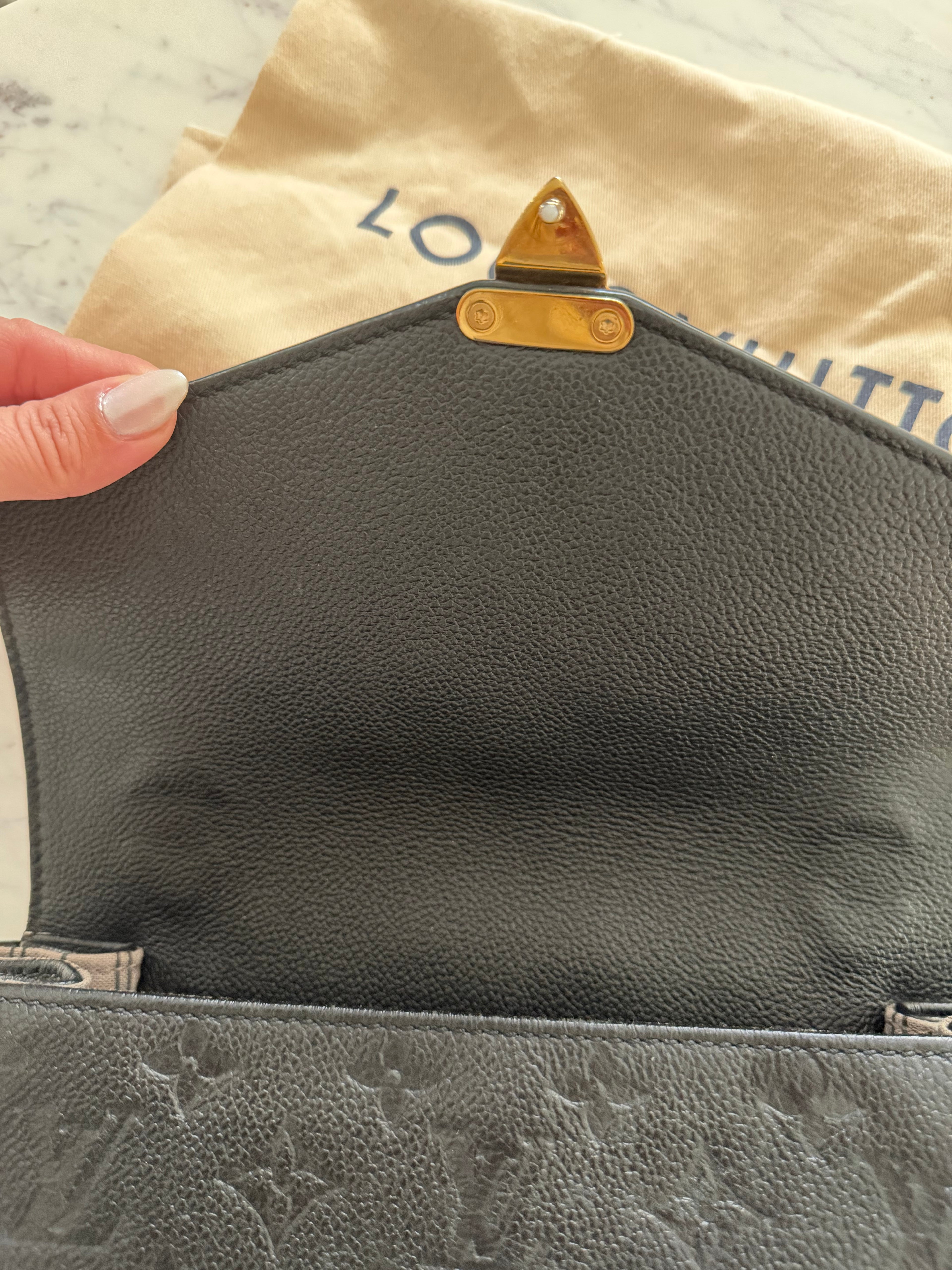 Louis Vuitton Pochette Metis Empreinte bag
