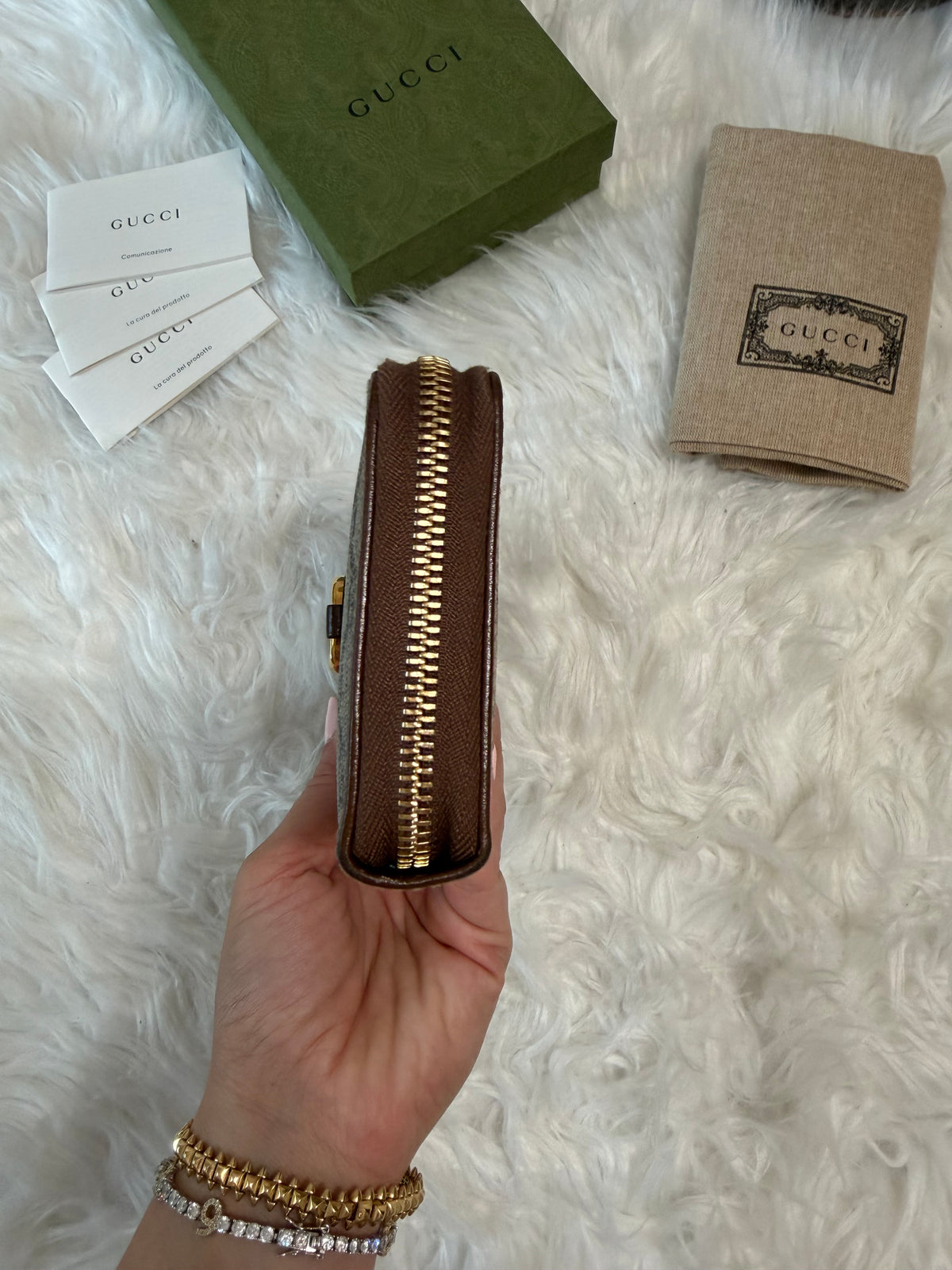 GUCCI  HORSESHOE SUPREME ZIP AROUND QUILTED CANVAS WALLET