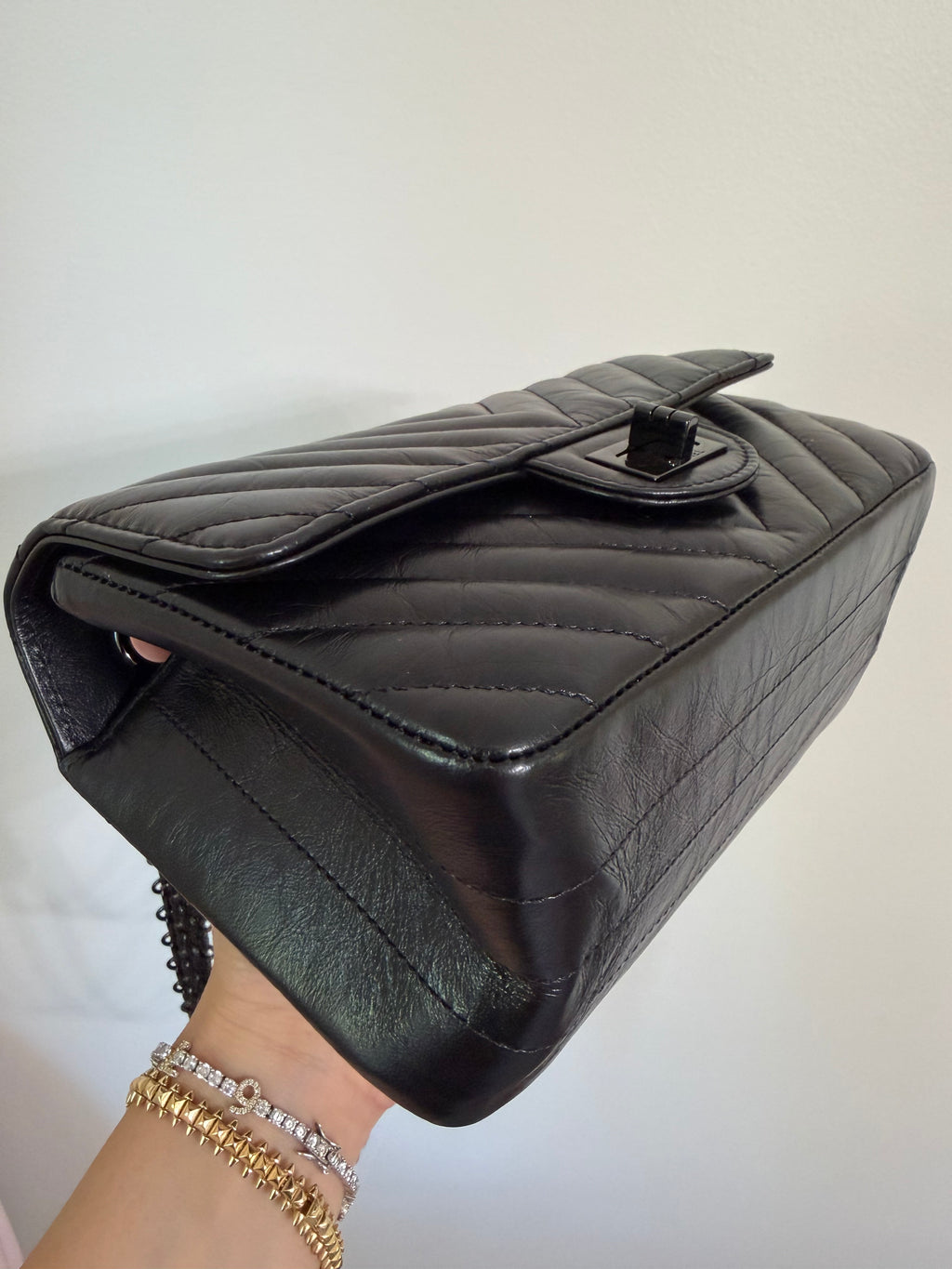 CHANEL SO BLACK REISSUE 2.55 FLAP CHEVRON AGED CALFSKIN