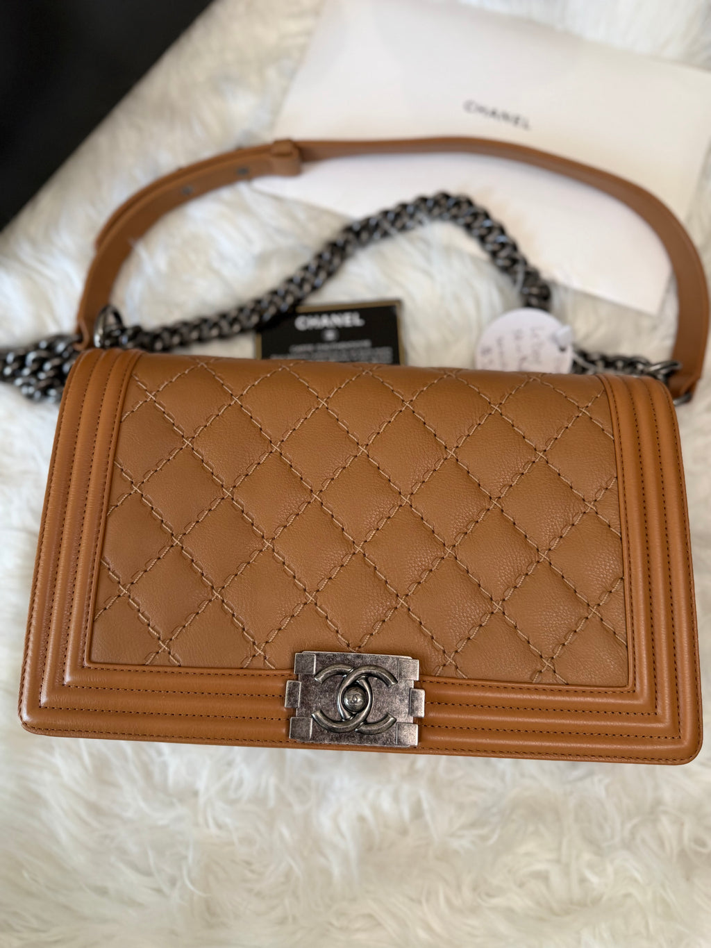CHANEL BOY FLAP BAG IN CAVIAR LEATHER