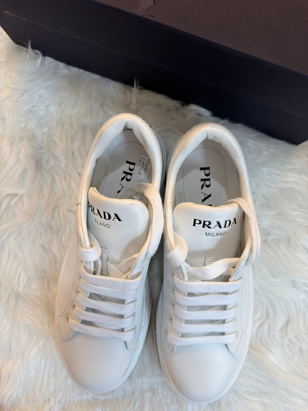 PRADA LOW TOP LEATHER SNEAKERS