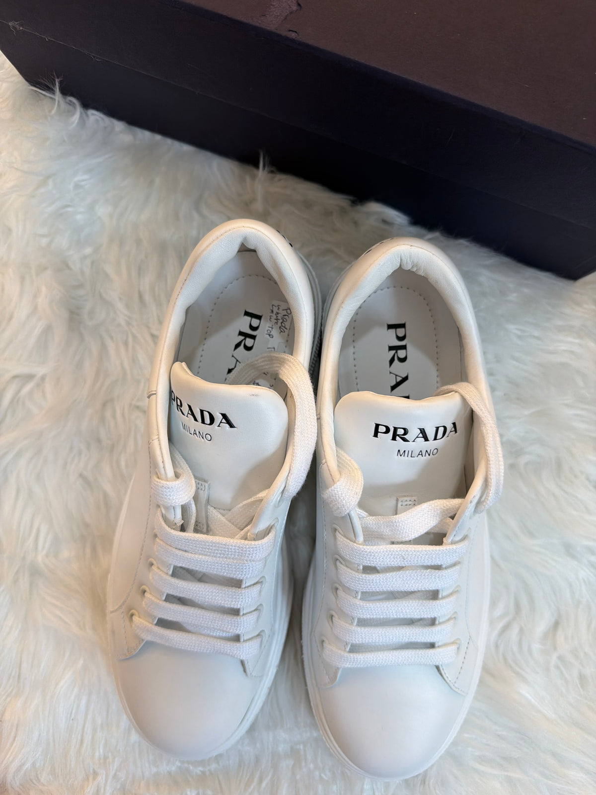 PRADA LOW TOP LEATHER SNEAKERS