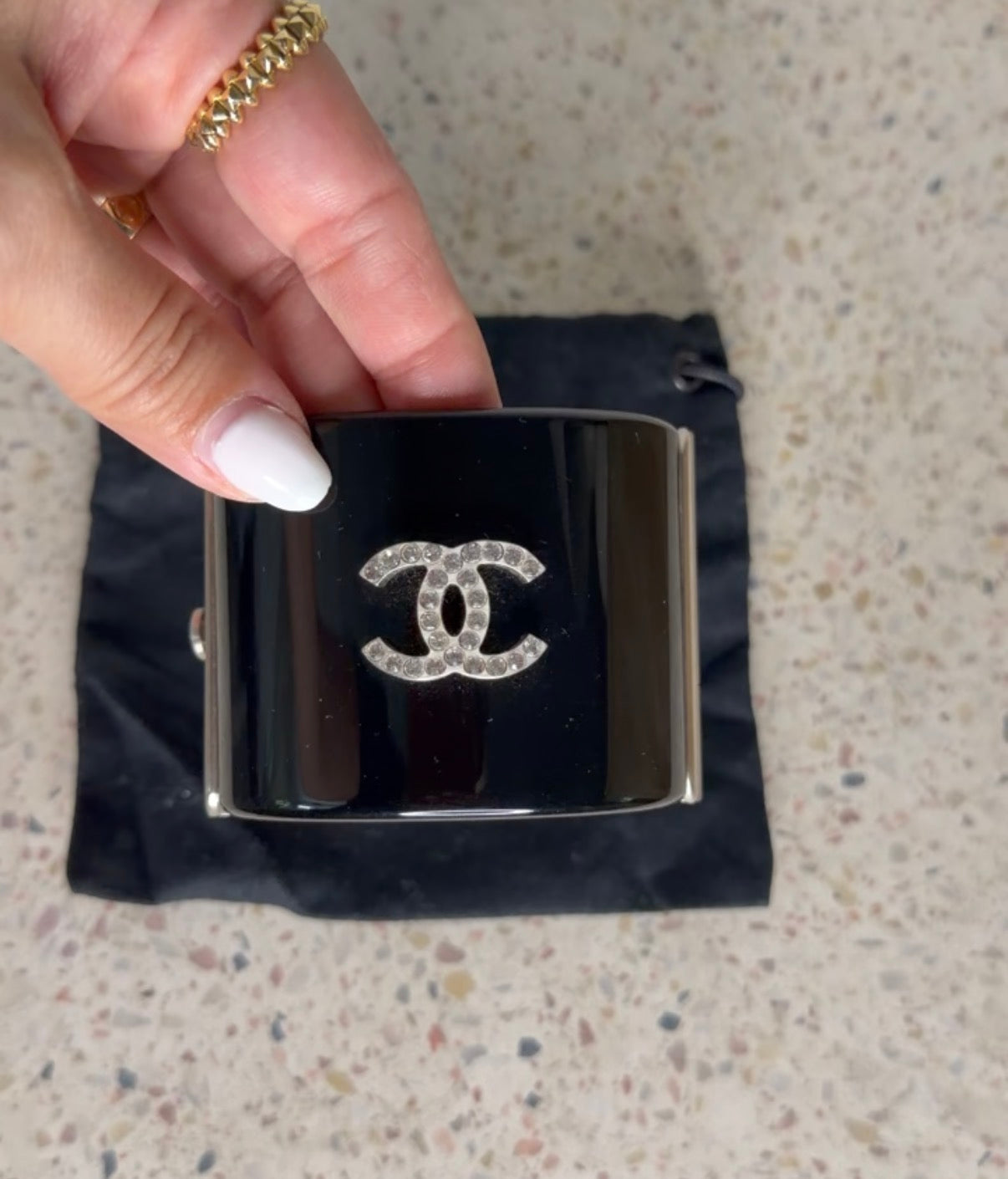 CHANEL BLACK RESIN AND CRYSTAL MOTIF WIDE CUFF BRACELET