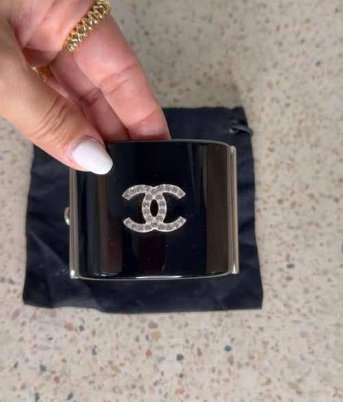 CHANEL BLACK RESIN AND CRYSTAL MOTIF WIDE CUFF BRACELET