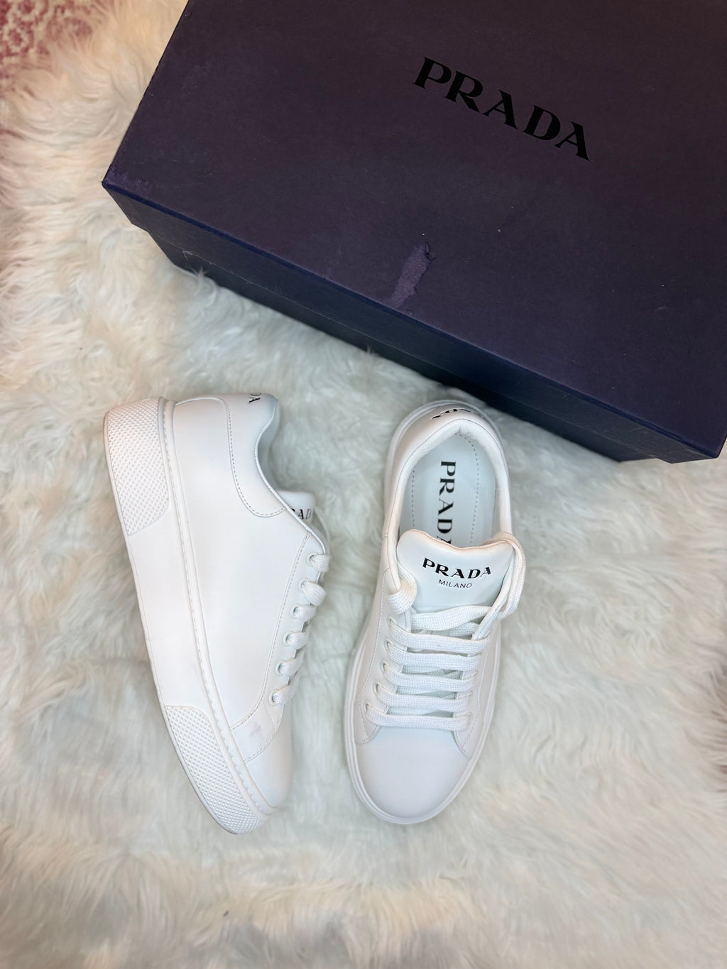 PRADA LOW TOP LEATHER SNEAKERS
