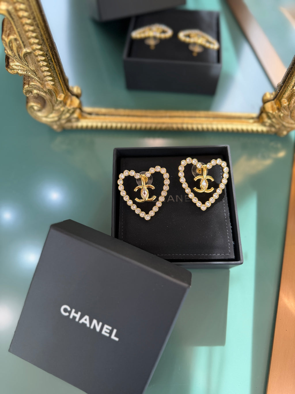 CHANEL HEART CUT OUT STUD EARRINGS