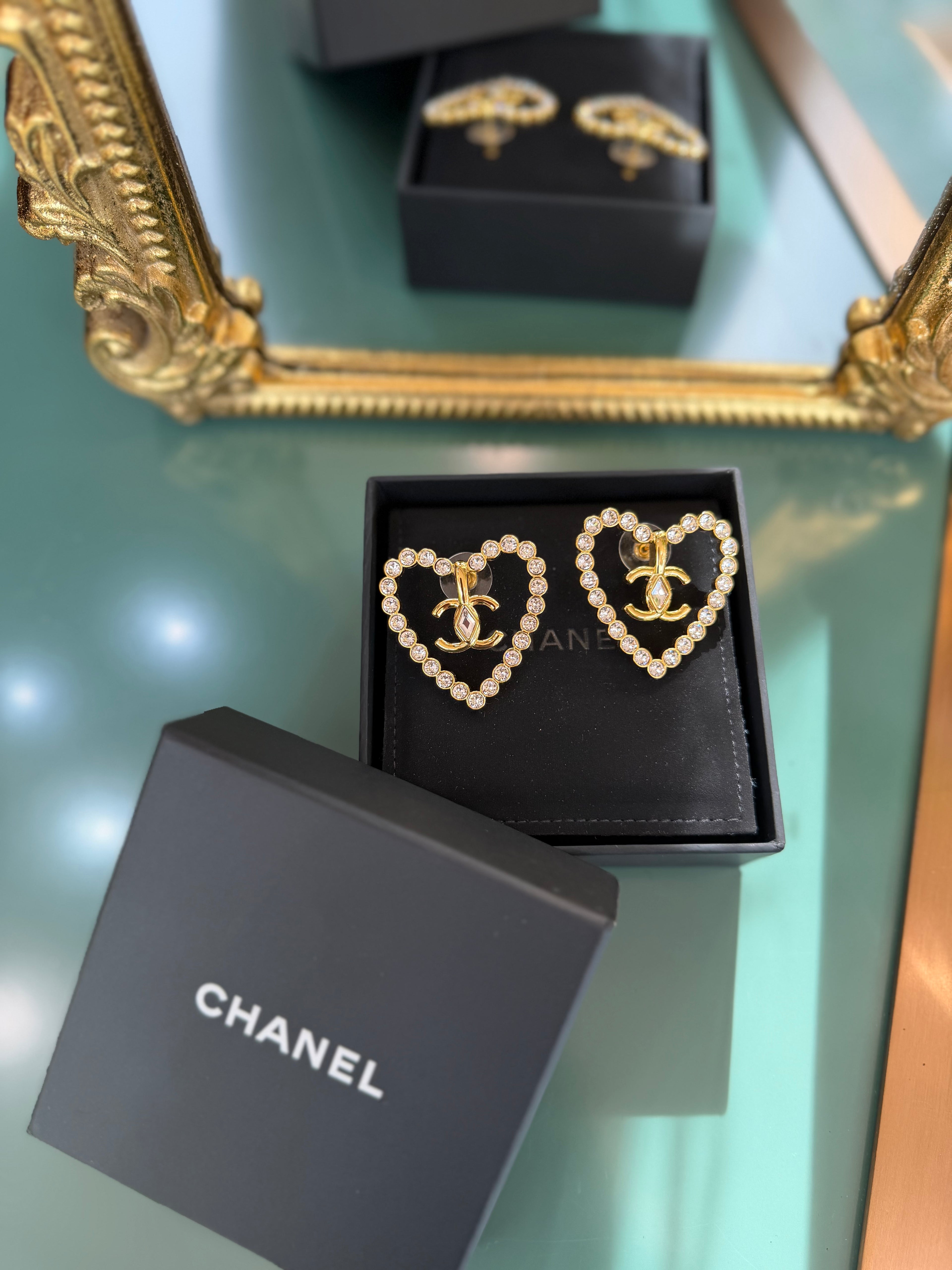 CHANEL HEART CUT OUT STUD EARRINGS