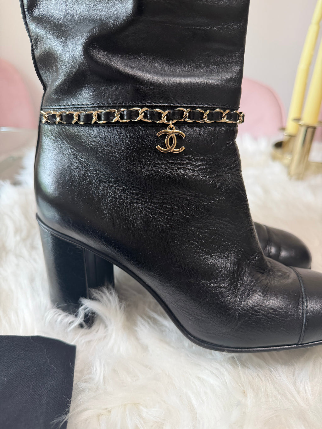 Chanel leather tall boots with a gold CC chain detail and block heel