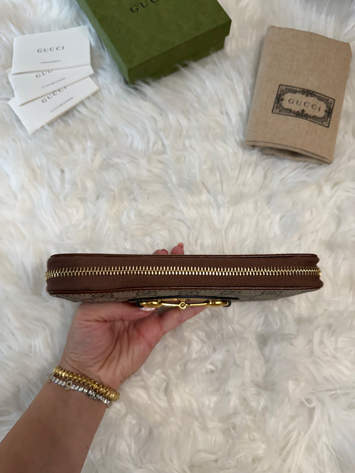 GUCCI  HORSESHOE SUPREME ZIP AROUND QUILTED CANVAS WALLET