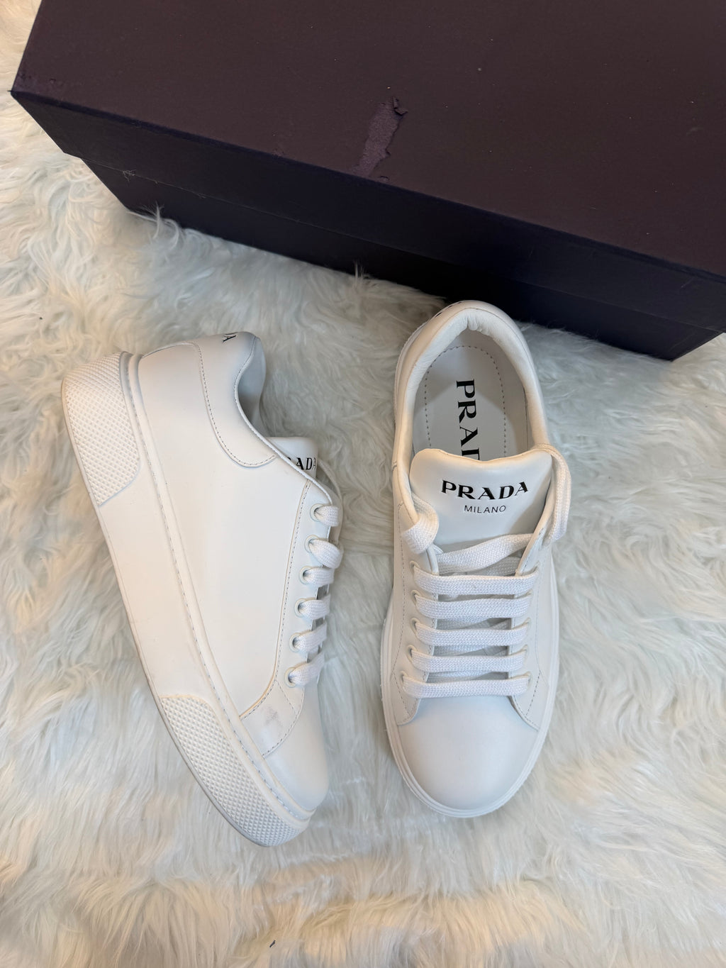 PRADA LOW TOP LEATHER SNEAKERS