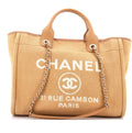 Chanel Medium Deauville tote bag in mixed fibers with gold-tone chain and leather handles