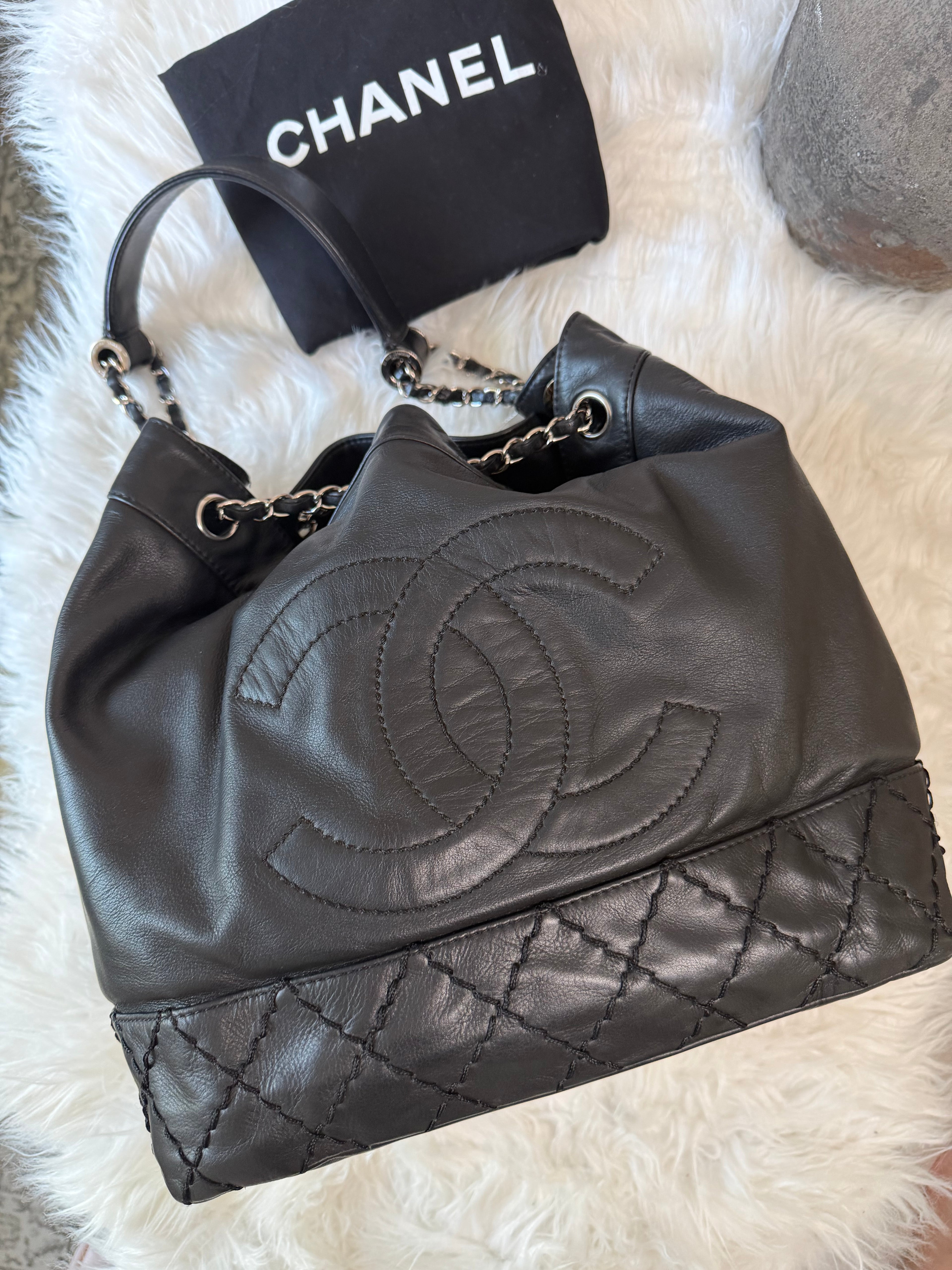 CHANEL SURPIQUE CC DRAWSTRING CALFSKIN BUCKET BAG