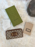 GUCCI  HORSESHOE SUPREME ZIP AROUND QUILTED CANVAS WALLET