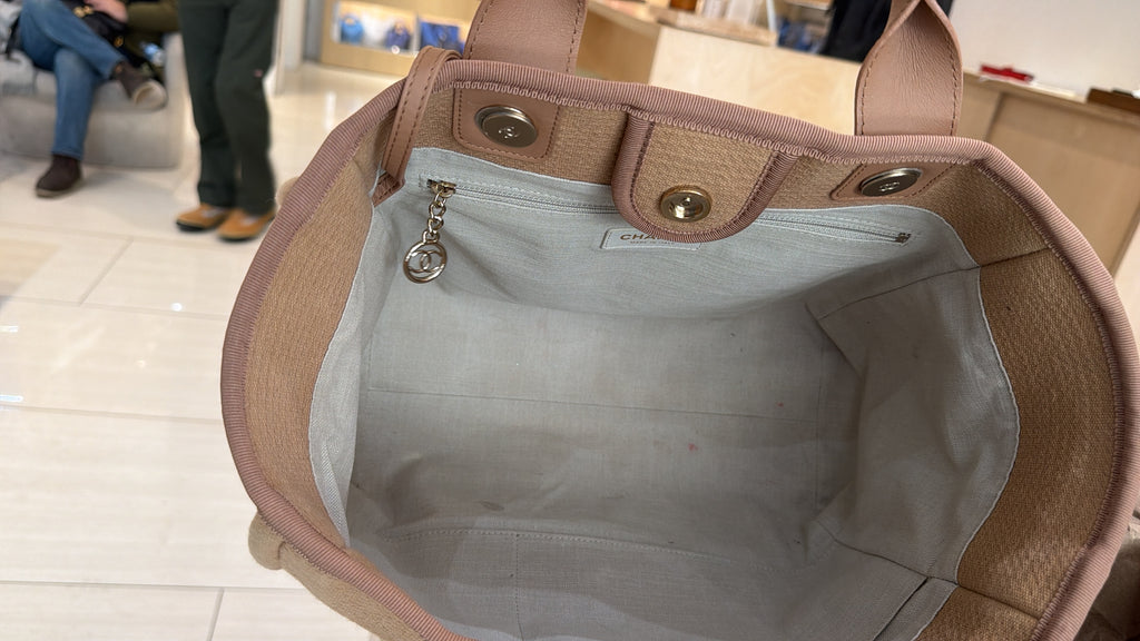 Chanel Medium Deauville tote bag in mixed fibers with gold-tone chain and leather handles