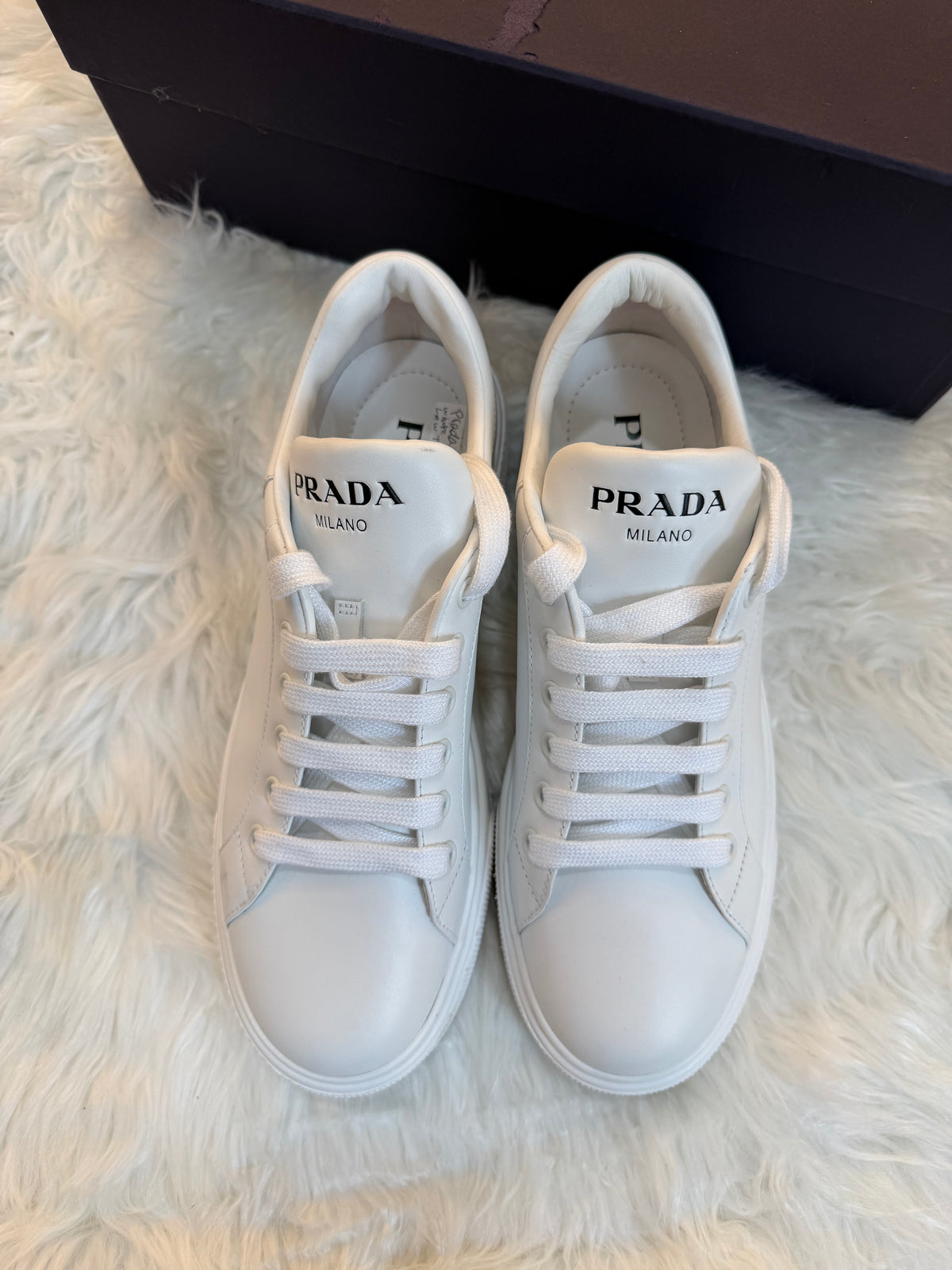 PRADA LOW TOP LEATHER SNEAKERS