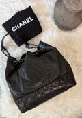 CHANEL SURPIQUE CC DRAWSTRING CALFSKIN BUCKET BAG