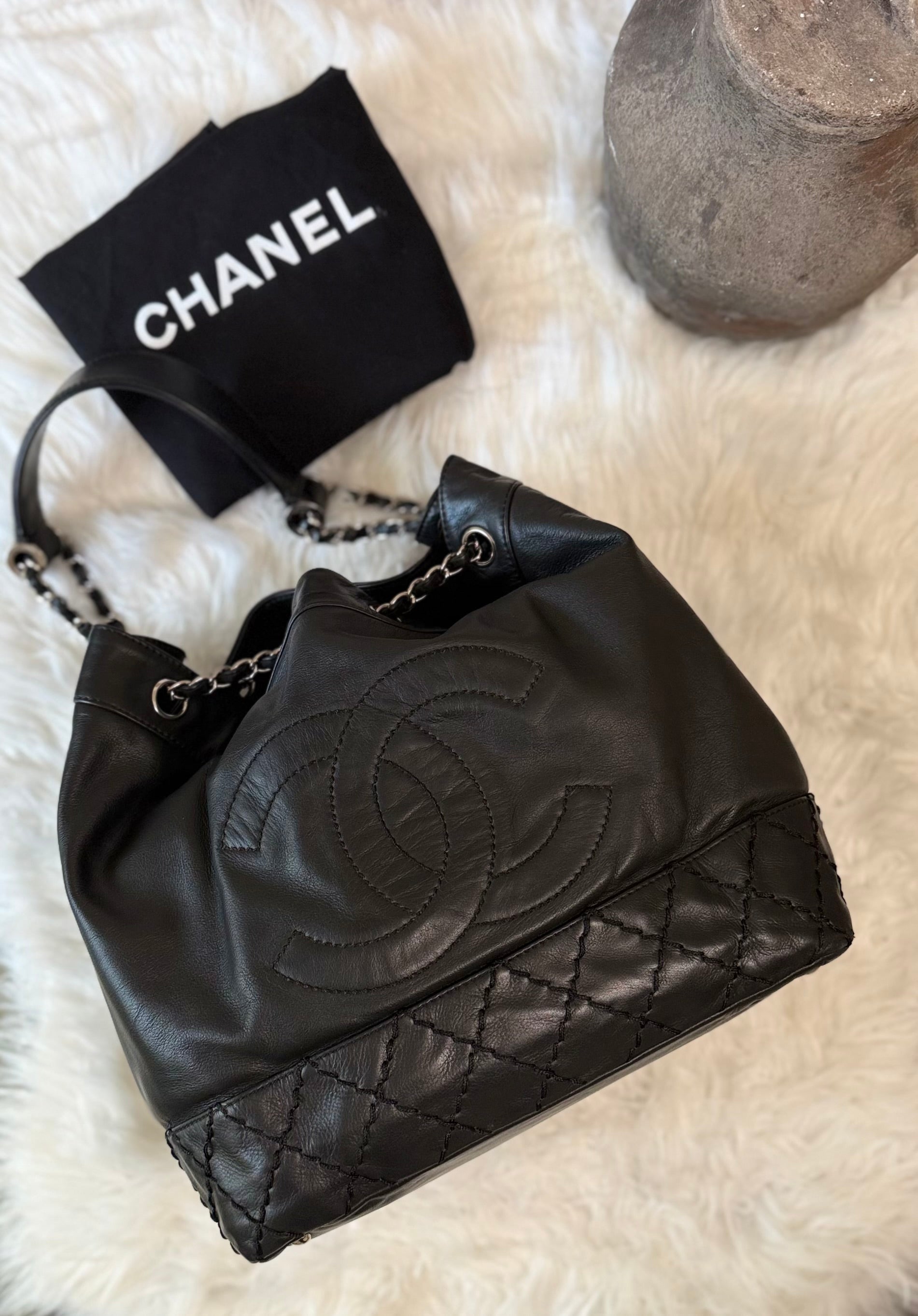 CHANEL SURPIQUE CC DRAWSTRING CALFSKIN BUCKET BAG