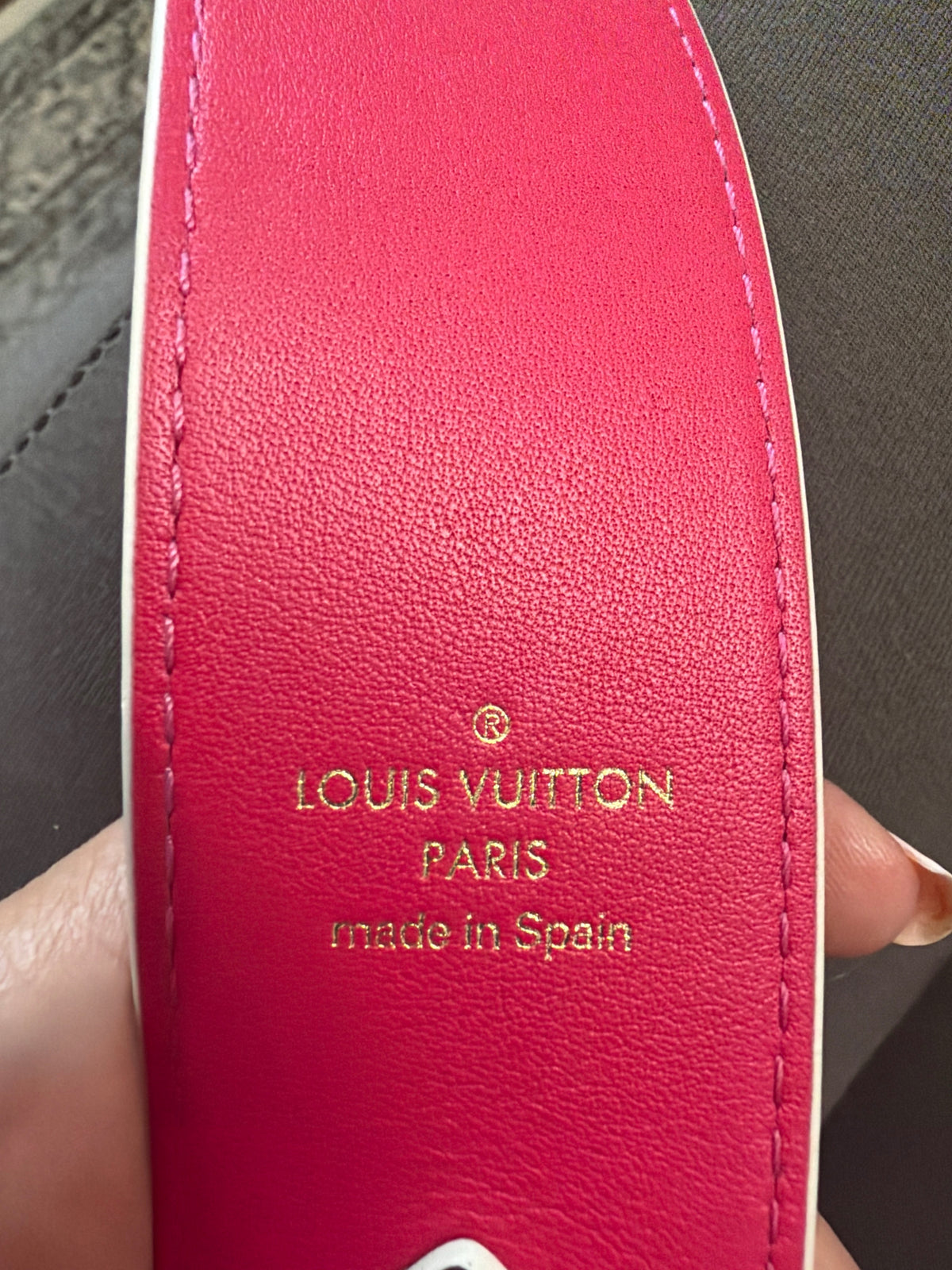 LOUIS VUITTON MONOGRAM SHOULDER STRAP WITH DISTINCTIVE HOT PINK LEATHER LINING