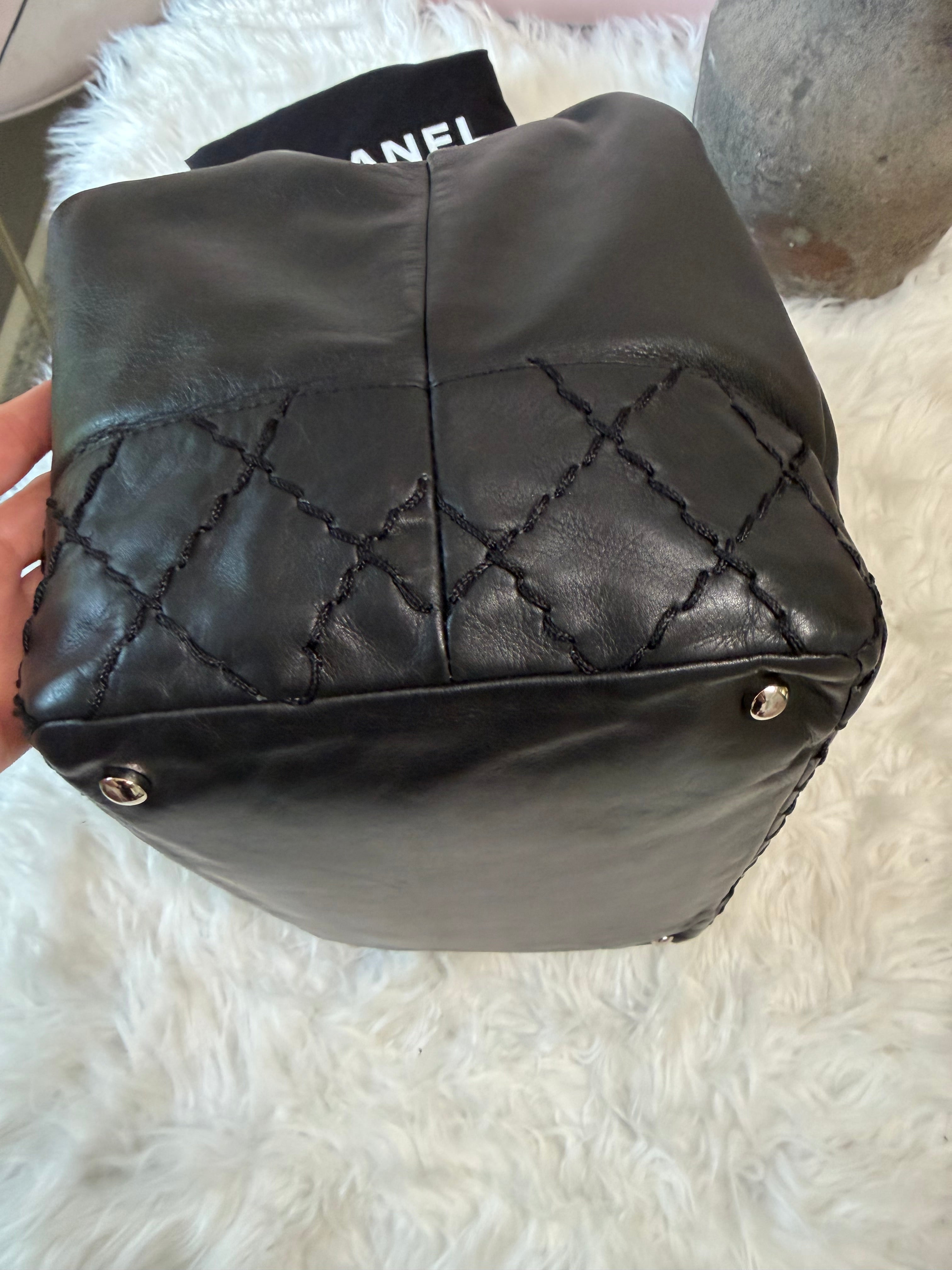 CHANEL SURPIQUE CC DRAWSTRING CALFSKIN BUCKET BAG