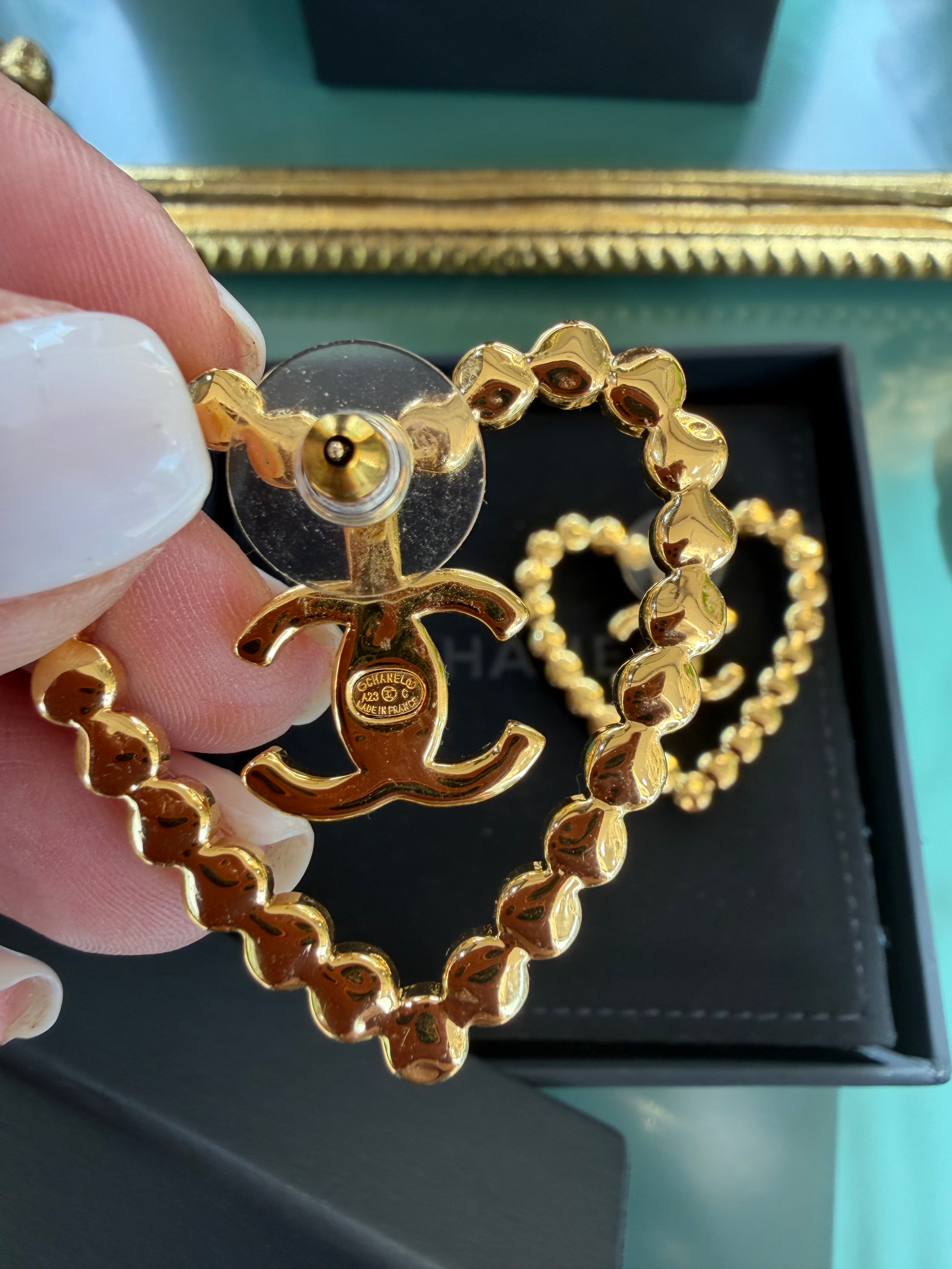CHANEL HEART CUT OUT STUD EARRINGS