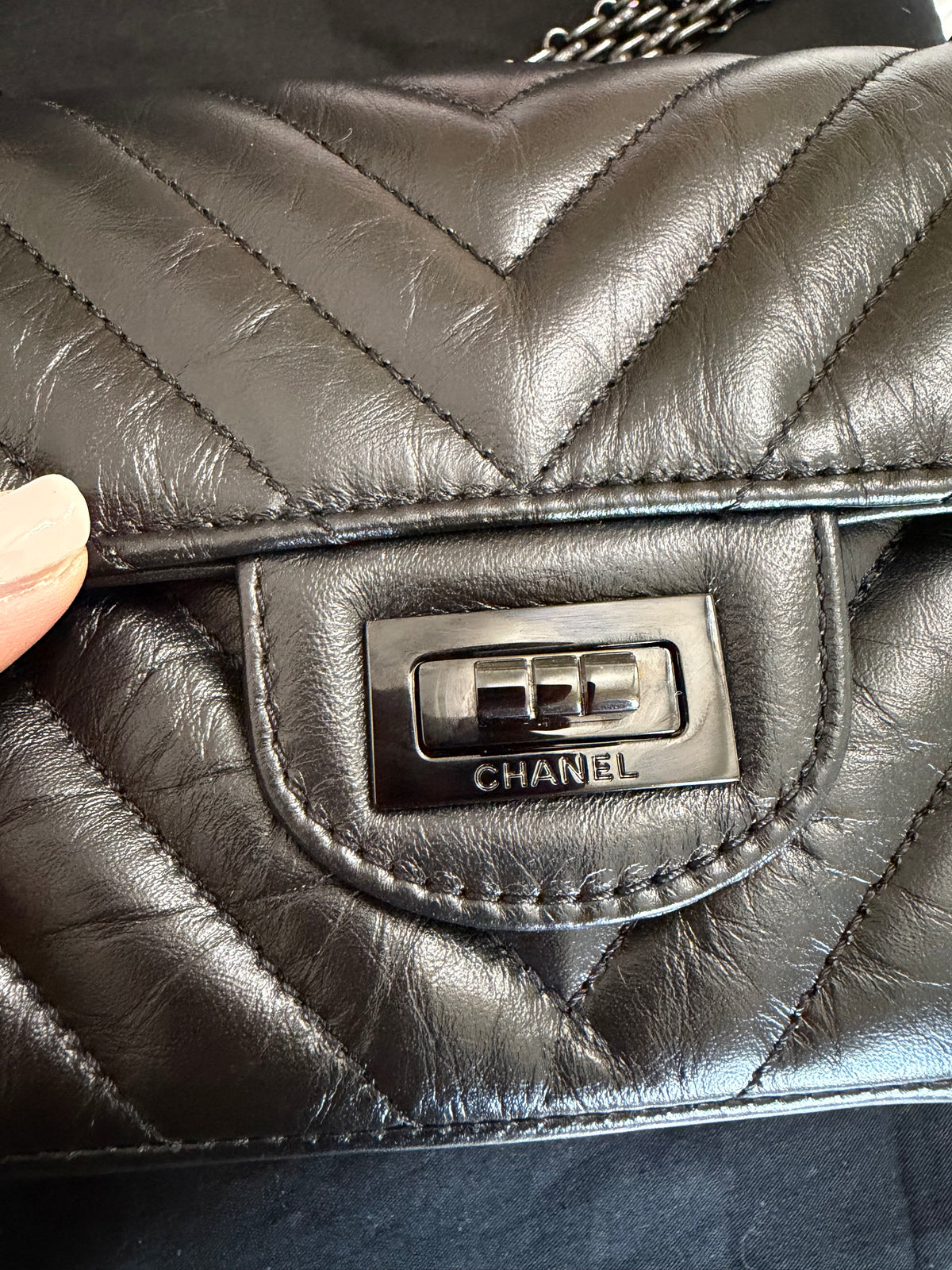 CHANEL SO BLACK REISSUE 2.55 FLAP CHEVRON AGED CALFSKIN
