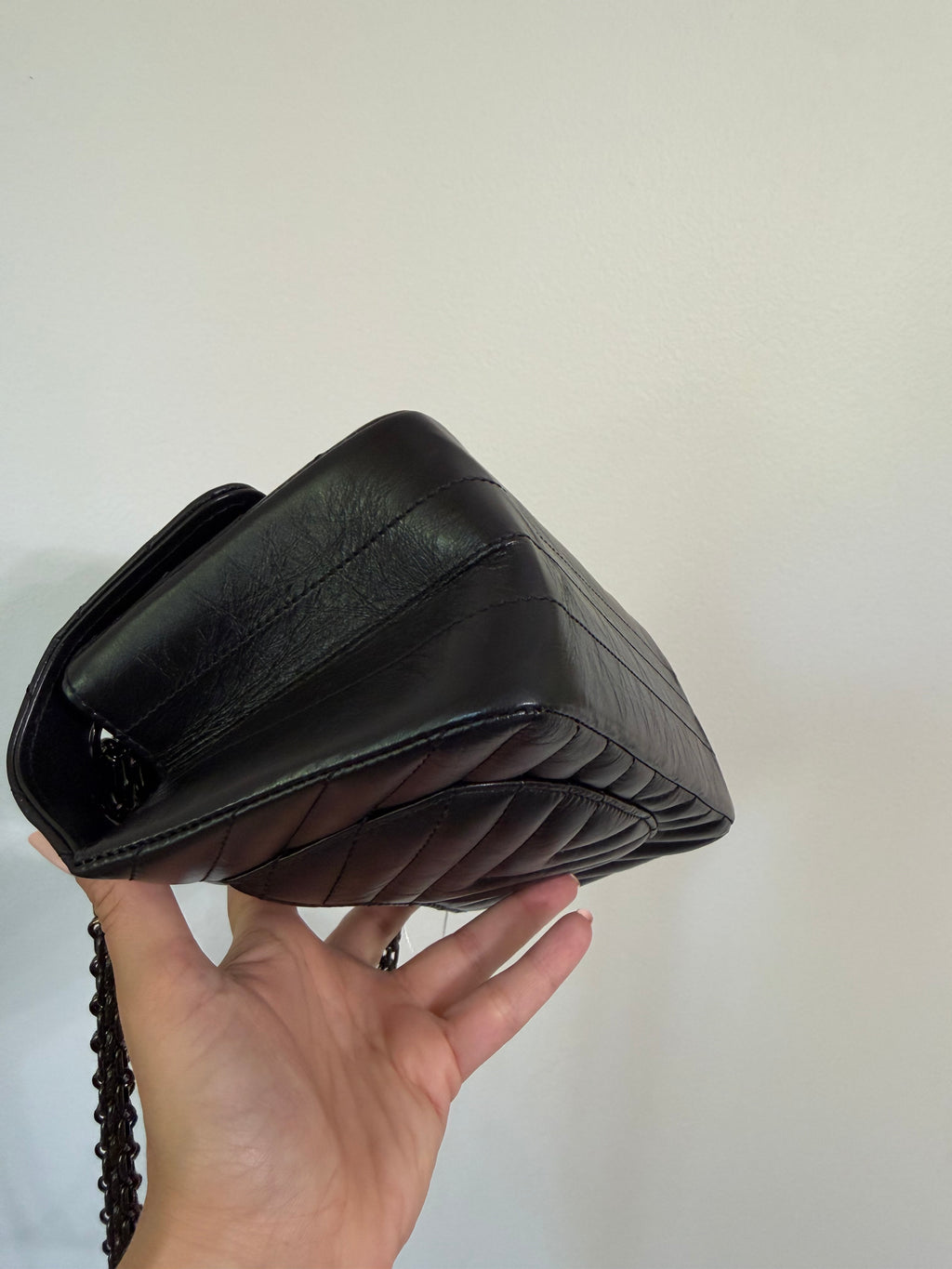 CHANEL SO BLACK REISSUE 2.55 FLAP CHEVRON AGED CALFSKIN