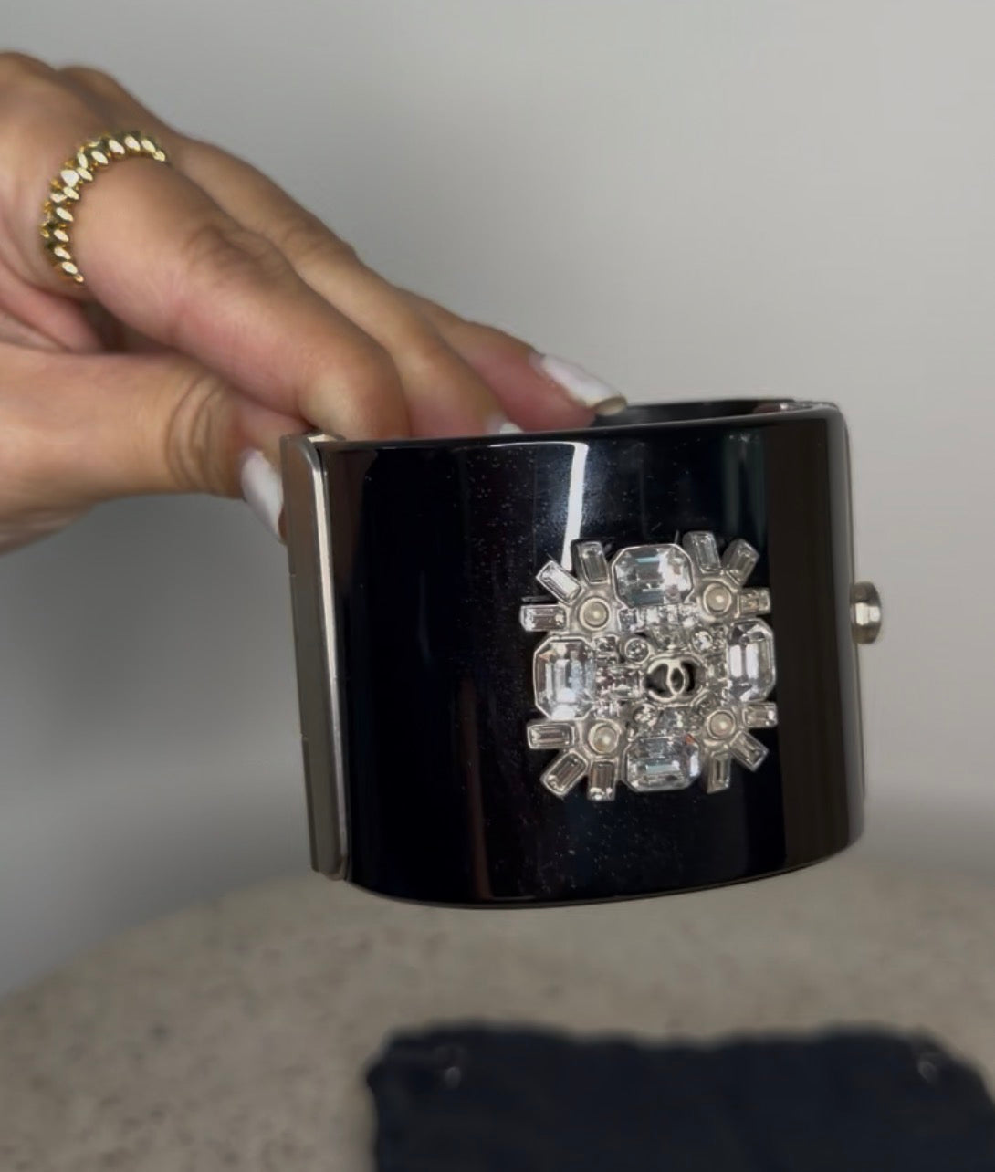 CHANEL BLACK RESIN AND CRYSTAL MOTIF WIDE CUFF BRACELET