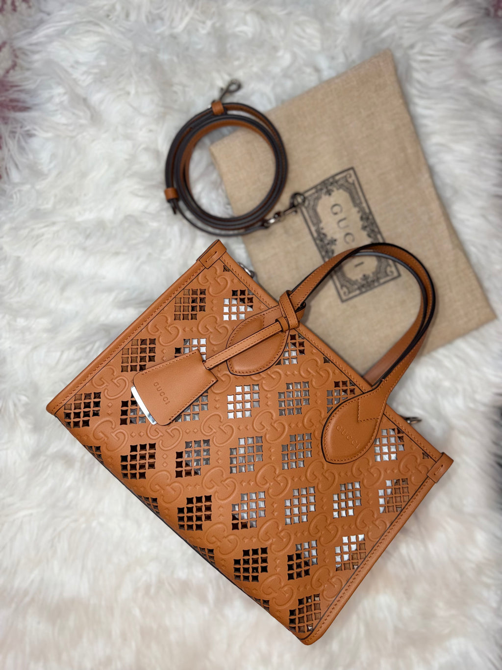 GUCCI GG EMBOSSED PERFORATED LEATHER TOTE BAG