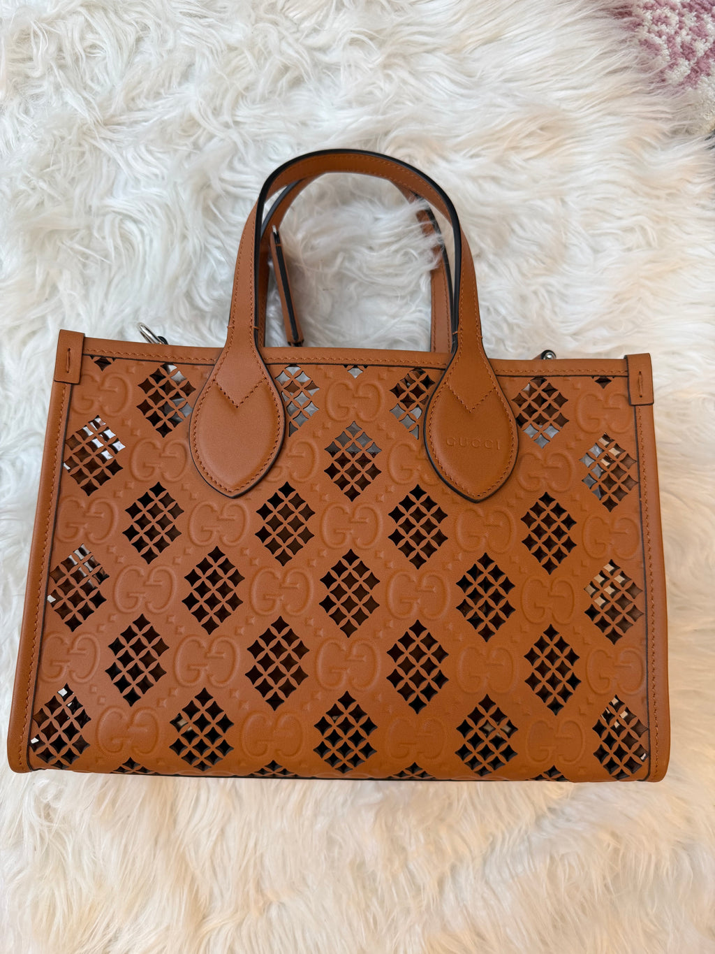 GUCCI GG EMBOSSED PERFORATED LEATHER TOTE BAG