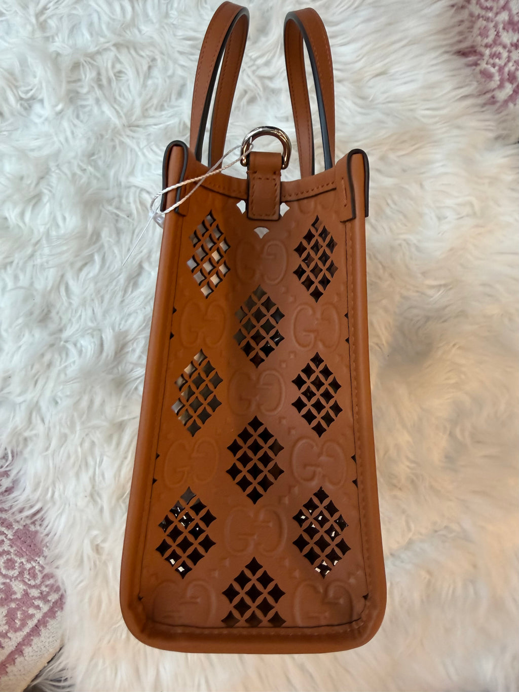 GUCCI GG EMBOSSED PERFORATED LEATHER TOTE BAG